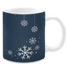 White ceramic 11oz mug with a dark blue background featuring white snowflakes of various sizes and dotted lines creating a winter theme.