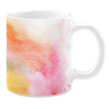 White 11oz ceramic mug featuring a vibrant watercolor design with shades of orange, pink, yellow, and subtle purple, creating a bold and artistic look.