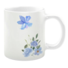 White 11oz ceramic mug featuring delicate watercolor blue flowers with green leaves, arranged at the bottom and a single flower accent near the top for a soft, elegant design.