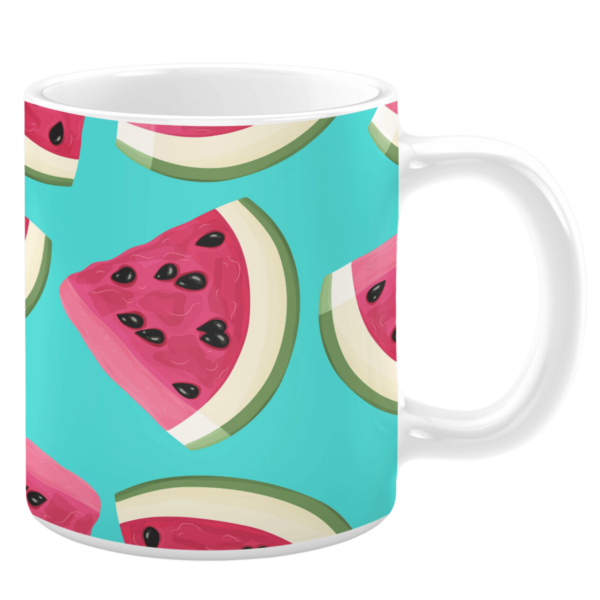 White ceramic 11oz mug featuring a playful pattern of vibrant watermelon slices with pink flesh, black seeds, and green rinds, set against a bright turquoise background, evoking a fresh and summery vibe.