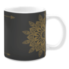 White 11oz ceramic mug featuring an elegant black background adorned with a detailed golden mandala design. The intricate pattern is complemented by subtle decorative flourishes, creating a sophisticated and artistic look.
