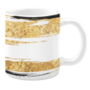 White 11oz ceramic mug featuring a bold abstract design with gold-textured brushstrokes accented by black streaks on a white background, creating a modern and luxurious look.