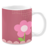 White ceramic 11oz mug featuring a minimalist design with a single pink flower with a green stem and leaves, set against a soft mauve background with a subtle grid pattern and scalloped accents at the base.