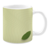 White 11oz ceramic mug featuring a minimalist design with a soft green background and subtle wavy line patterns. A single green leaf accent is placed near the bottom, creating a fresh and natural aesthetic.