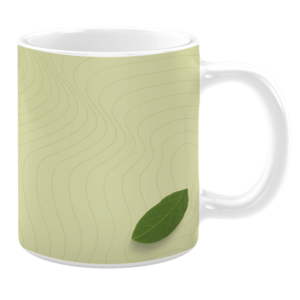 White 11oz ceramic mug featuring a minimalist design with a soft green background and subtle wavy line patterns. A single green leaf accent is placed near the bottom, creating a fresh and natural aesthetic.