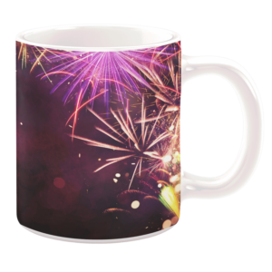 White 11oz ceramic mug featuring a vibrant fireworks display with bursts of purple, gold, and pink against a dark background, creating a festive and celebratory design.