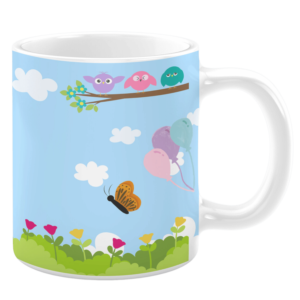 White ceramic 11oz mug featuring a cheerful springtime scene with three colorful birds perched on a branch, a butterfly in flight, pastel balloons floating, and vibrant flowers blooming in a green meadow under a bright blue sky with fluffy clouds.