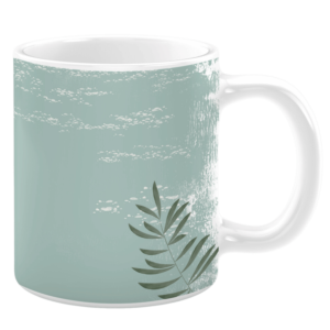 White ceramic 11oz mug featuring a textured, rustic design with a soft sage green background, subtle white distressed patterns, and a single fern leaf in deep green, evoking a calm and natural aesthetic.