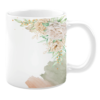 This mug features a soft floral design with delicate cream-colored roses and muted greenery. The watercolor-style accents add a graceful touch, perfect for elevating your coffee or tea experience.