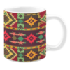 This mug features a vibrant geometric pattern with diamonds, stars, and triangles in bold red, yellow, green, and brown shades. The design has a lively, tribal-inspired aesthetic.