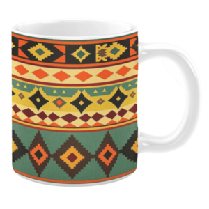 White ceramic 11oz mug featuring a vibrant geometric pattern. The design includes horizontal bands with diamond and triangular shapes in shades of orange, yellow, green, black, and maroon, inspired by traditional motifs.