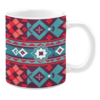 White ceramic mug featuring a vibrant geometric pattern in red, teal, and purple, with intricate diamond shapes and star motifs, creating a bold and Southwestern-inspired design.