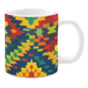 This mug features a vibrant geometric pattern in bold shades of yellow, red, green, and blue, creating an energetic, symmetrical design.