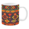 This mug features a bold tribal-inspired pattern with diamond shapes in rich hues of red, yellow, green, and orange, creating a striking, vibrant design.