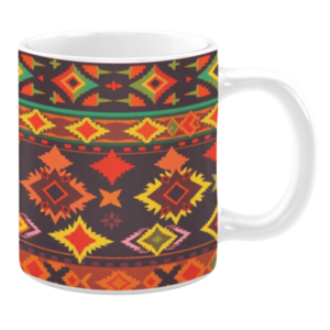 This mug features a bold tribal-inspired pattern with diamond shapes in rich hues of red, yellow, green, and orange, creating a striking, vibrant design.
