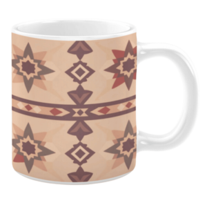 Ceramic mug with a soft beige background featuring geometric star motifs and diamond shapes in earthy tones of red, brown, and tan.