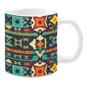 Ceramic mug featuring a vibrant tribal-inspired pattern with geometric shapes in red, orange, teal, green, and yellow on a dark background.