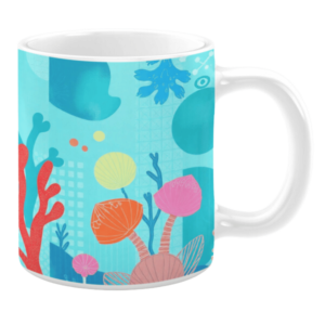 Ceramic mug featuring a vibrant underwater scene with illustrations of coral, abstract aquatic shapes, and sea plants in bold shades of red, pink, orange, yellow, and blue. The background includes subtle geometric patterns and bubbles, adding depth to the oceanic design.