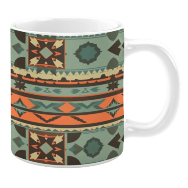 Ceramic mug featuring a geometric tribal-inspired design in teal, orange, and beige tones, accented with horizontal patterns, diamonds, and star motifs.