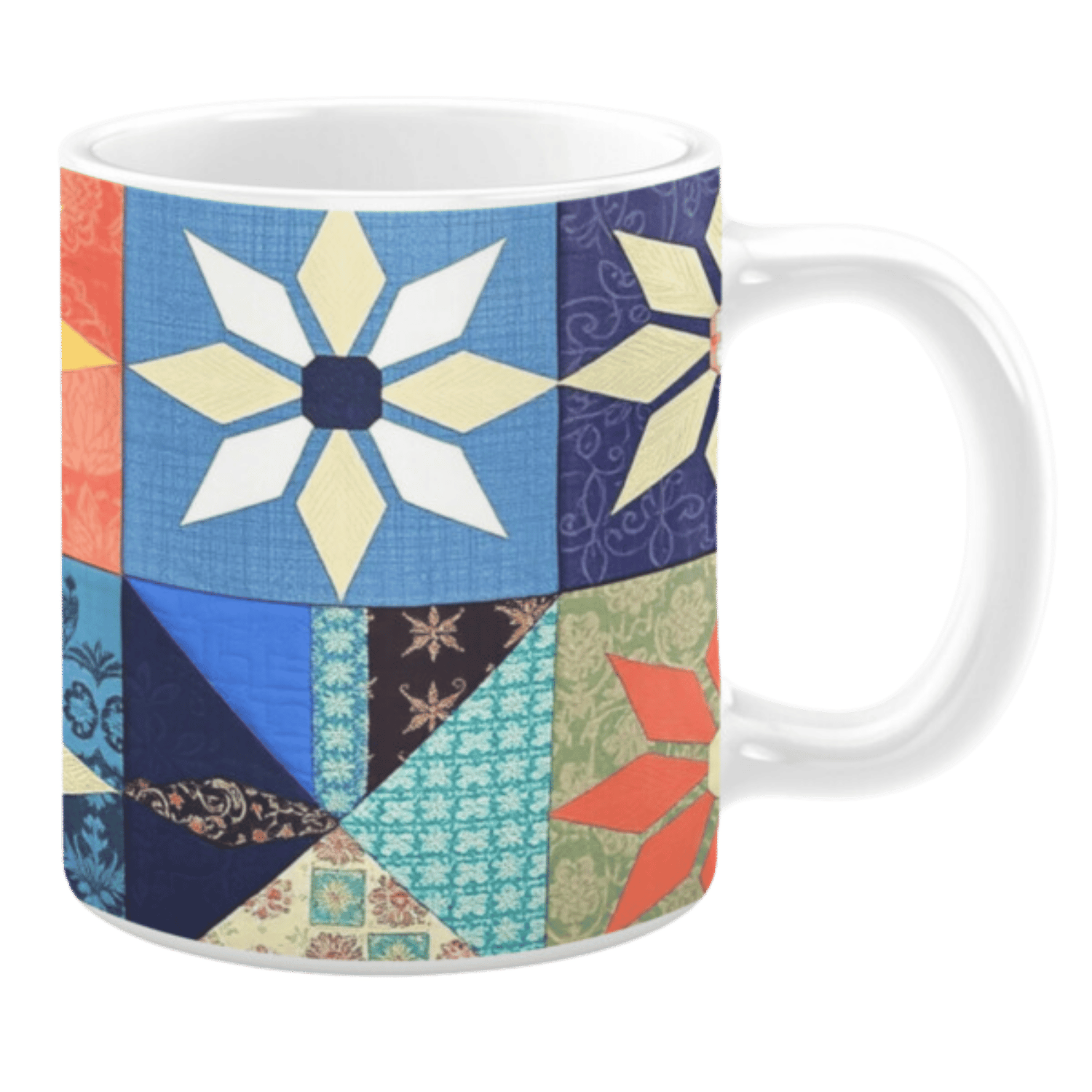 White ceramic mug featuring a patchwork quilt design with floral and geometric patterns in vibrant shades of orange, blue, green, and purple, creating a cozy and colorful aesthetic.
