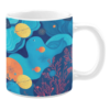White ceramic mug featuring a serene underwater scene with abstract flowing shapes, vibrant coral in shades of pink, playful fish, and bright yellow circular accents, creating a calming and colorful oceanic design.