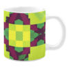 Colorful ceramic mug with geometric patterns in green, yellow, and purple tones