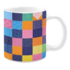 olorful patchwork ceramic mug with multicolored square patterns