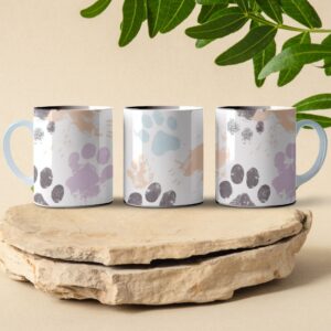 pastel water color dog paw print pattern coffee mug design